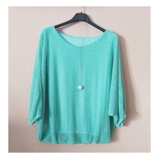 Blusa ancha media manga