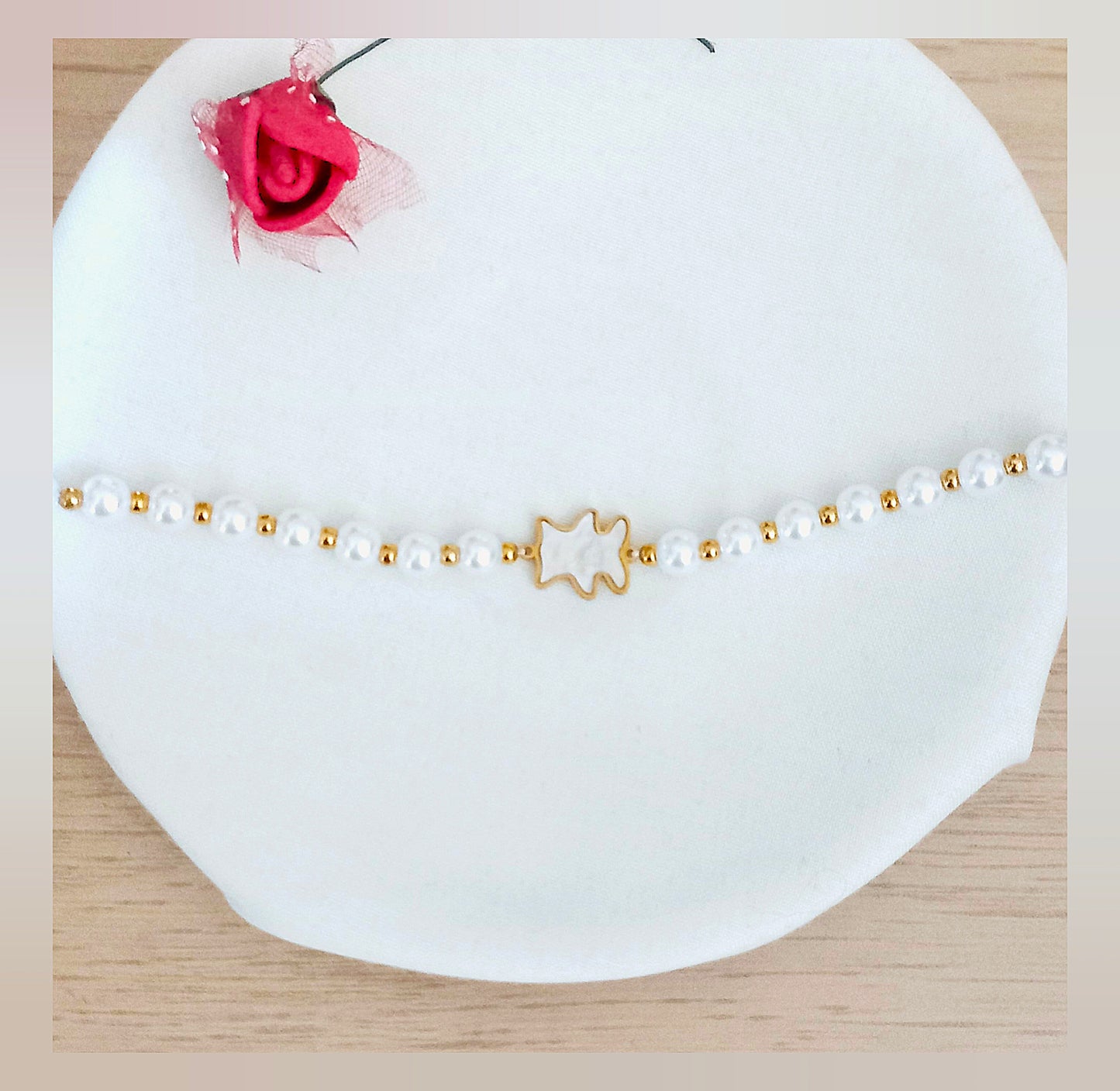 Pulsera perlas y Oso nácar acero