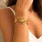 Brazalete ancho Sol acero