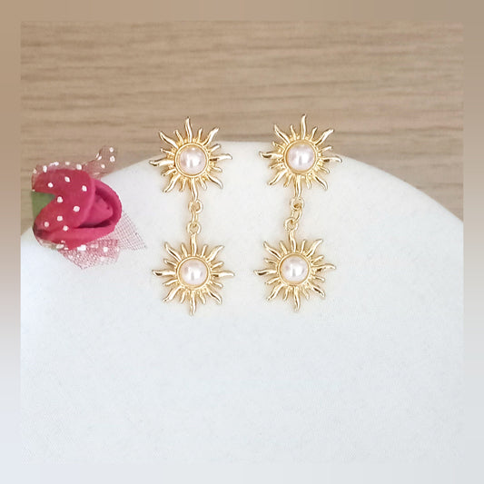 Pendientes largos Sol perla