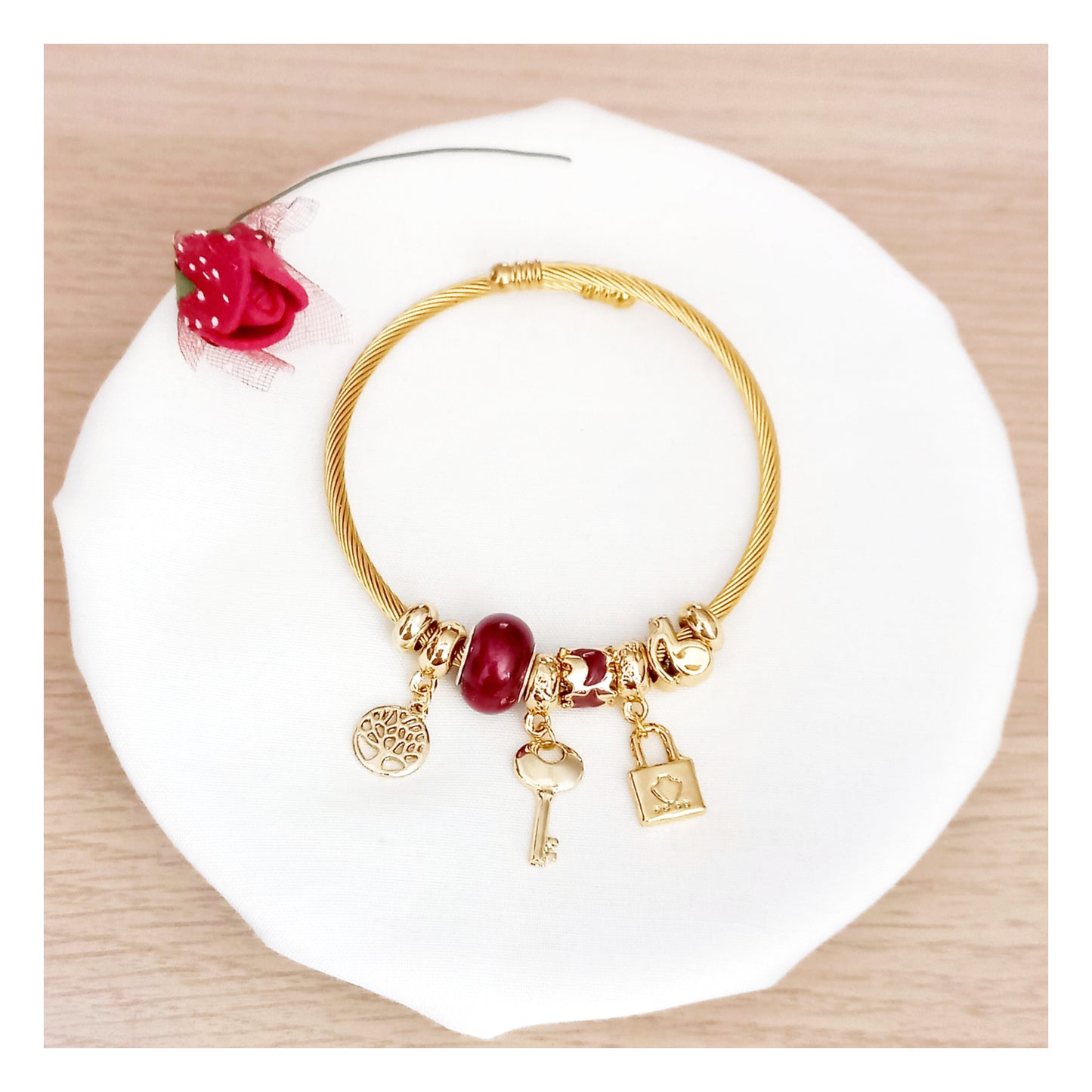 Pulsera rígida charms acero