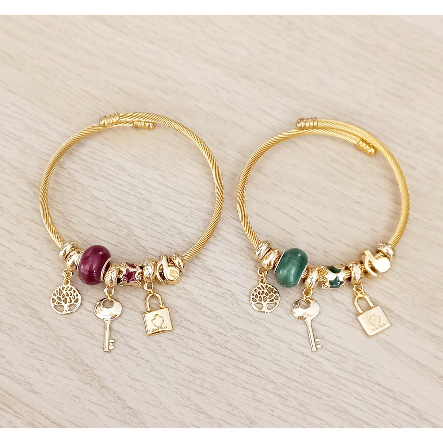 Pulsera rígida charms acero