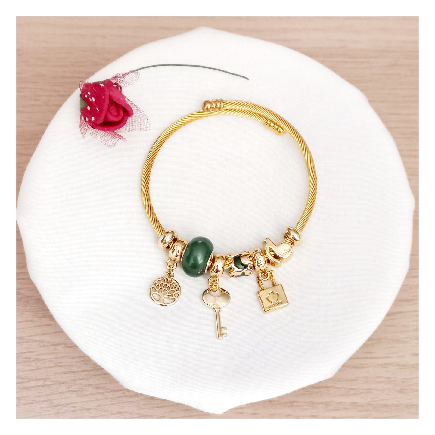 Pulsera rígida charms acero