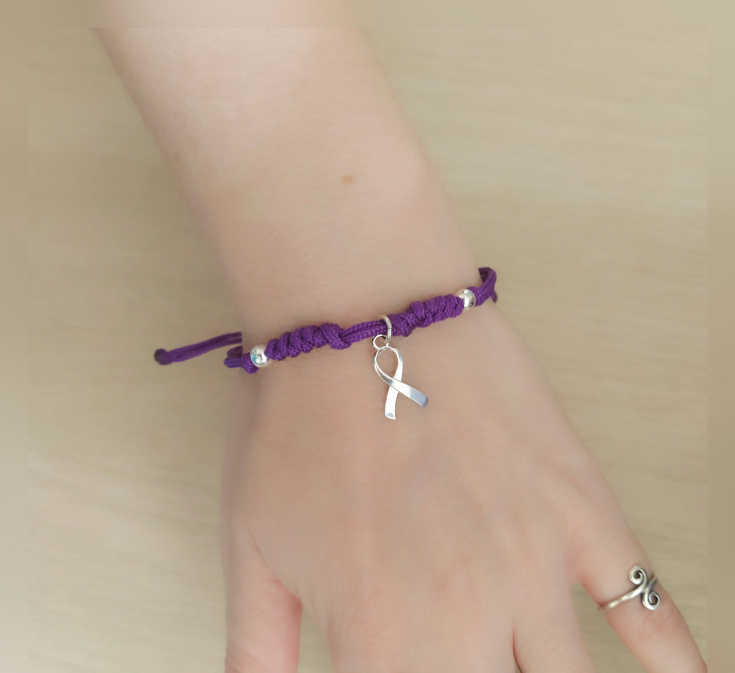 Pulsera solidaria Cáncer plata