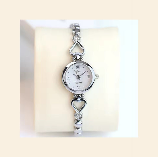 Reloj corazón plateado acero